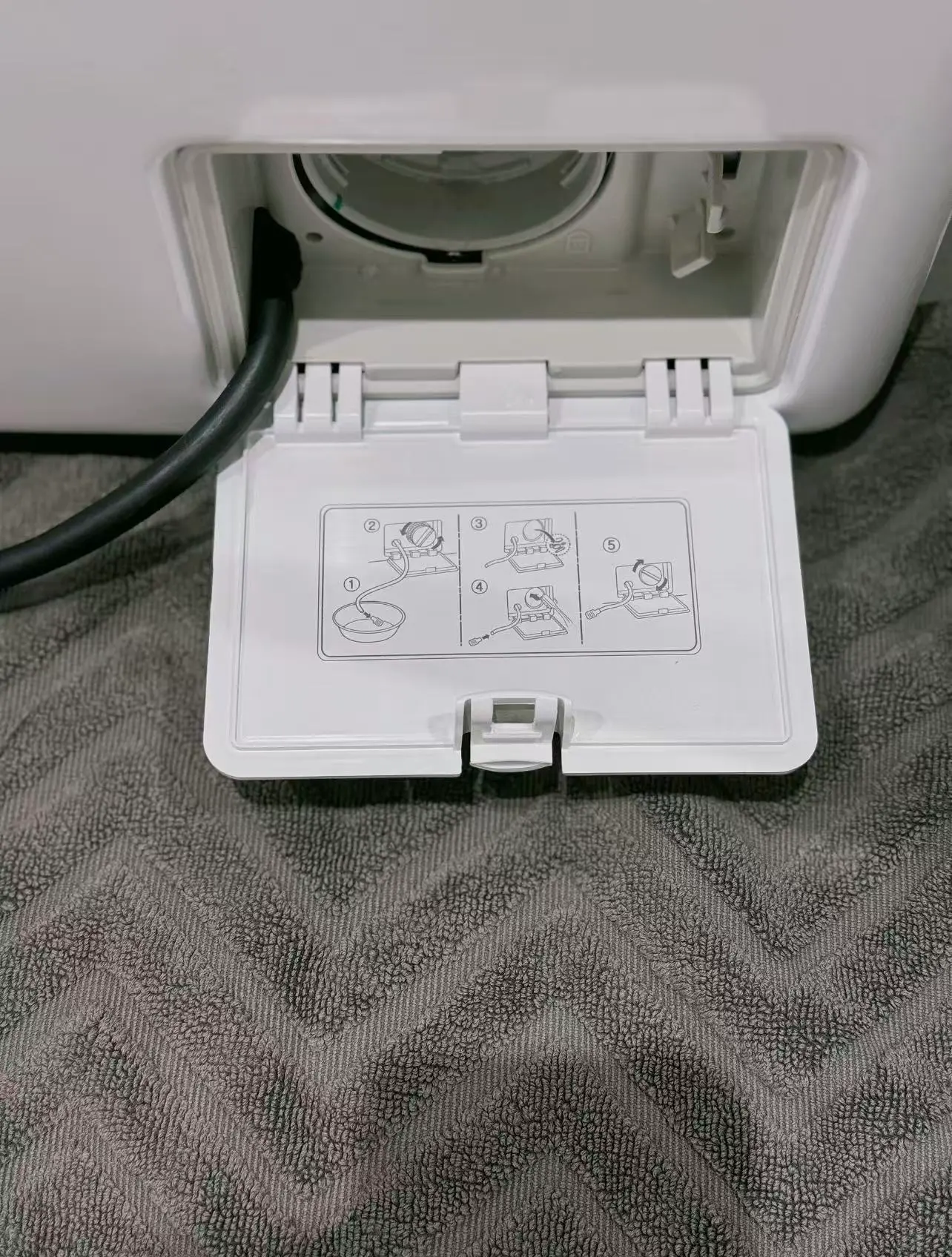 Whirlpool washer pump filter location — coin trap access on front-load washer