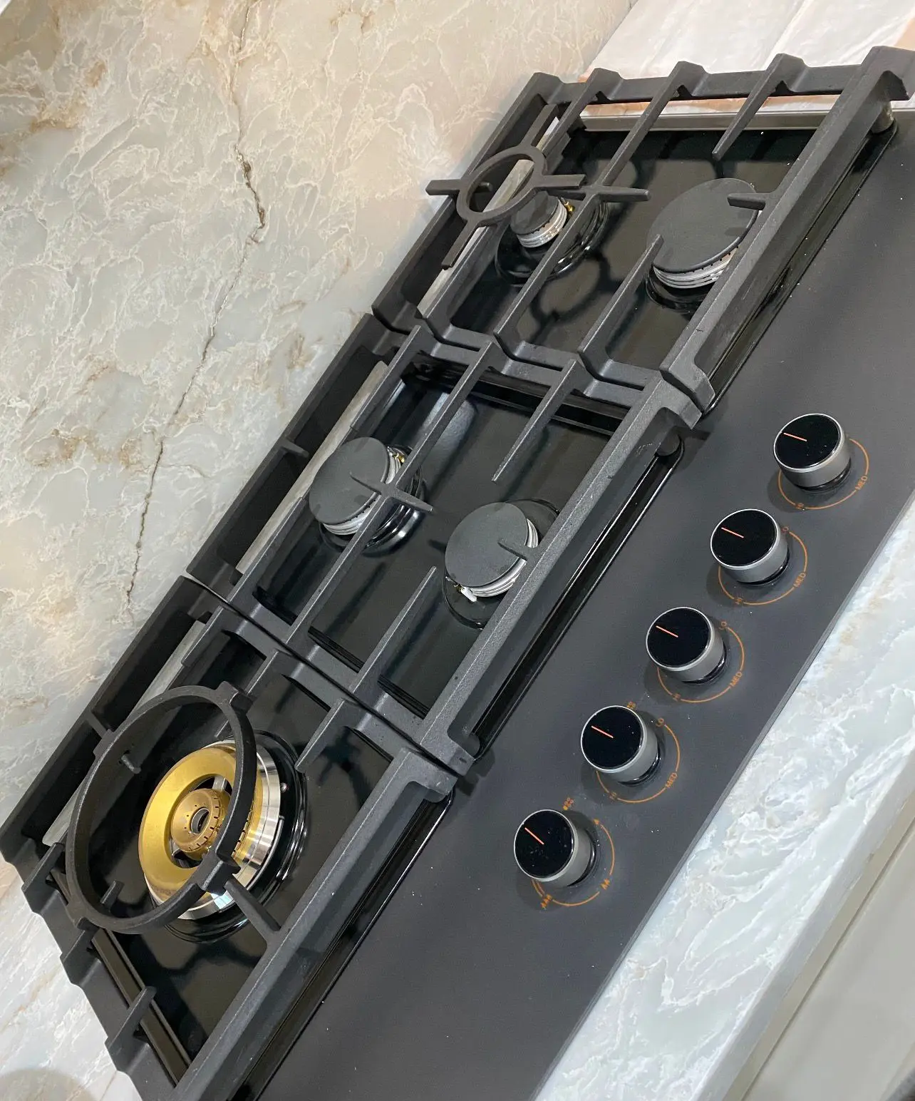 Gas appliance repair in Halifax — gas cooktop burner flame close-up